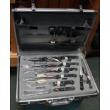 An aluminium case of kitchen knives