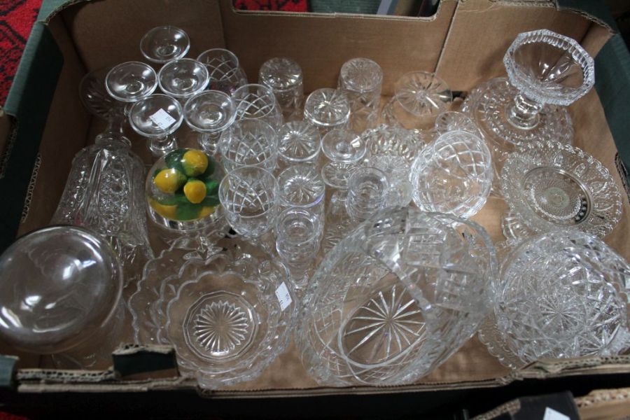 A box of assorted glass wares.