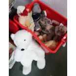 A collection of soft toys, to include a white bear, together with a tiger print throw / rug