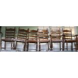 Four single oak ladderback chairs together with two carvers (6)