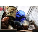 A box containing a selection of domestic and collectible items.