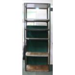 A set of tall metal storage shelves