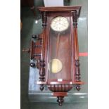 An 1880 mahogany wall clock