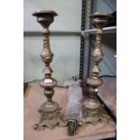 Pair cast brass pricket alter candlesticks with 19 brass stair rods and brackets.