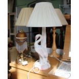 Four table lamps, one modelled as a pottery heron.