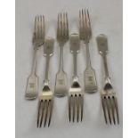 William Sutton and sons Ltd, a set of silver fiddle pattern dessert forks, engraved Lion head over p