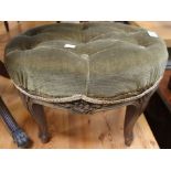 An oval footstool, button fabric upholstered top