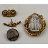 A Victorian cameo brooch, depicts the three graces, together with an Australian brooch, of Kangeroo