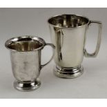 I.S.Greenberg & co, a silver Christening mug, Birmingham 1913, together with a larger silver christe