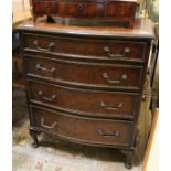 A reproduction burr walnut veneered chest of four graduating drawers.