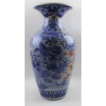 A Japanese Imari vase, painted cobalt blue bird and peony decoration, iron red highlights, 47cm high