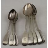 Francis Higgins lll, five silver fiddle pattern dessert spoons, London 1882 together with four silve