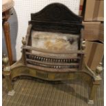 A regency design brass fronted fire basket.