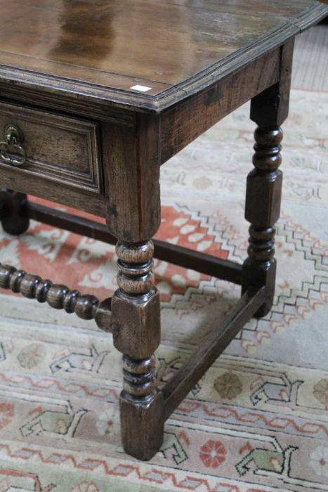 A part 19th century oak side table turned and blocked legs with single drawer, bobbin turned stretch - Image 4 of 4