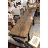 A 17th century oak refectory table, single plank top, 1 3/4" deep,