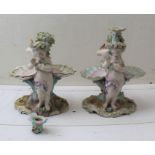 A pair of 19th century Continental porcelain candlesticks
