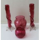 Two pairs of cranberry glass vases, and two cranberry bowls