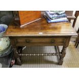 A part 19th century oak side table turned and blocked legs with single drawer, bobbin turned stretch