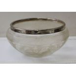 A cut glass fruit bowl, with silver rim, 20cm in diameter, and a lemonade jug