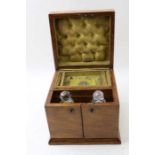 A Victorian dressing table box, opens to reveal drawers and bottles within, 18cm wide