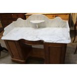 A Victorian twin pedestal marble top washstand, 128cm wide