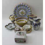 A collection of Continental faience items, includes a shallow bowl, with petal moulded rim, painted
