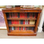 A reproduction Yew wood open front bookcase plus contents, 98cm wide