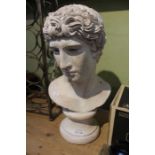A modern pottery bust of Greek athlete