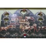 An alpine decorative wall hanging, painted with a herd of cattle with herdsmen.