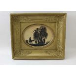 A Regency cut out silhouette depicts figures at a well, 15cm x 20cm, oval mounted, in a gilt frame