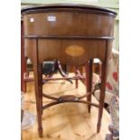 A reproduction Regency style oval lift lid side table