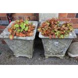 A nice pair of cast concrete lattice planters.