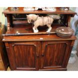 A 19th century mahogany cabinet, upstand back with shelf and mirror, over two cupboard doors, 103cm