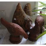 Four terracotta garden chickens, three being Whichford pottery, the largest 48 cm high