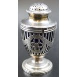 C.S.Harris and Sons Ltd, a silver pepper pot of Georgian urn form, pierced and chased swag decoratio