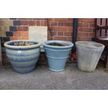 Three pottery bucket planters.