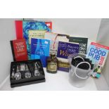 Box of Wine Related Books, 1 bottle An Ice Bucket A quantity Chrystal Wine Stoppers (boxed) A Cham