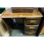 A small oak desk, fitted a pedestal of four drawers, 81cm wide