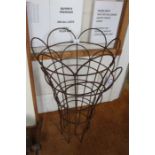 Two iron basket shaped plant trainers