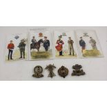 A collection of four Hussars and Lancers cap badges, together with informative regimental postcards