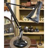 A Herbert Terry Anglepoise lamp, black, together with a small stool
