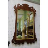 Antique design fret cut mirror.