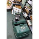 An Atco Balmoral 17s lawnmower with grass collection box