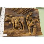 C A Morand - carved wooden panel depicting a cowshed milking scene