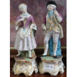 A pair of Continental ceramic figures, 26cm high