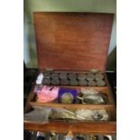 Mahogany box of mixed UK coinage including silver examples.