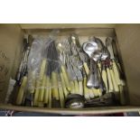 A box of various cutlery to include silver examples.