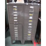 Two metal set of filing drawers one 15 drawer, one 12 drawer