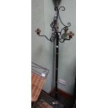 A fancy cast metal Floor standing candelabra with twist cast iron decoration