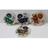 A set of four octagonal, Indian marble coasters, inlaid floral designs, using various stones, includ